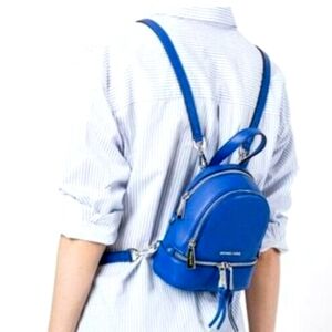 Michael Kors Rhea Zip Electric Blue XS leather backpack purse 💙